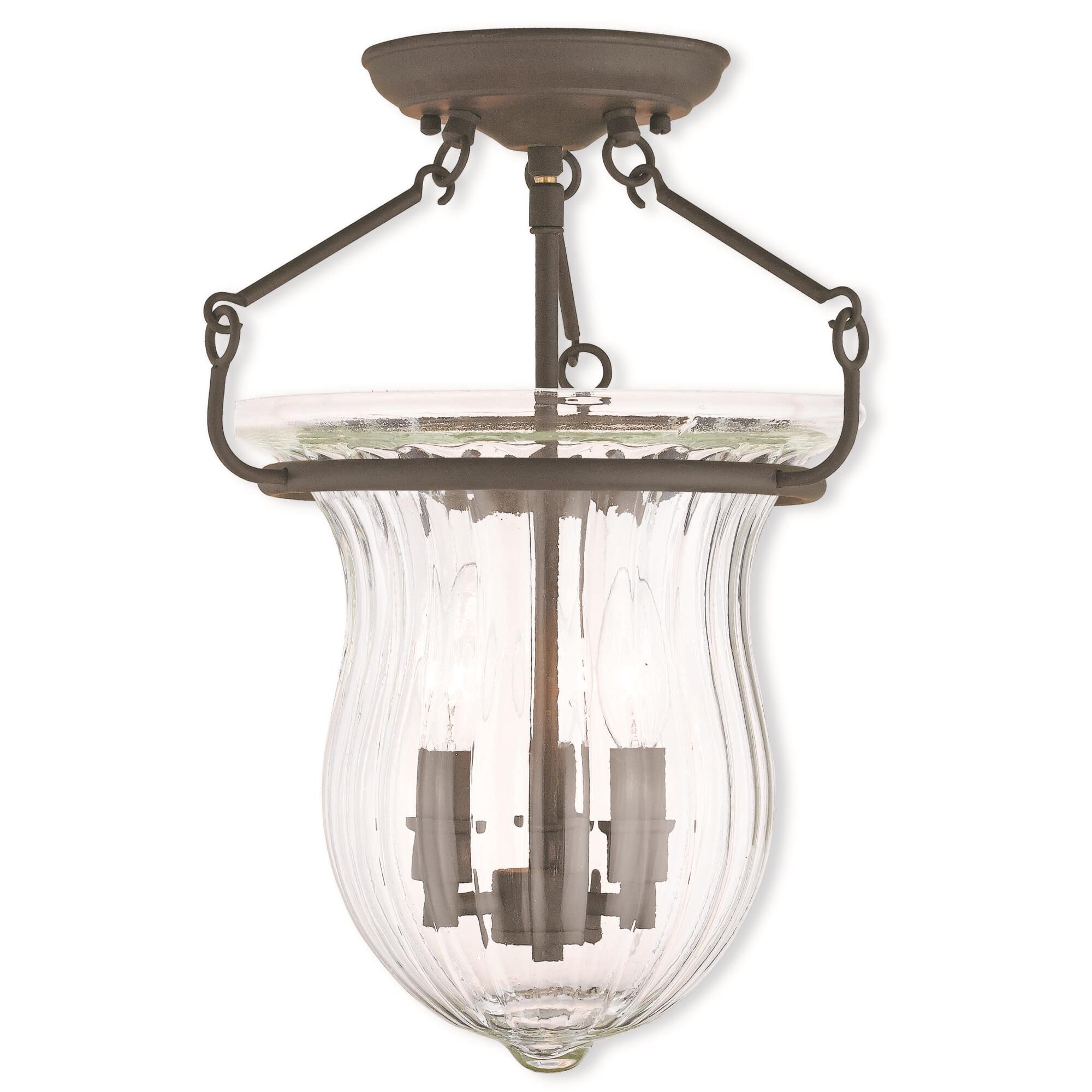 Shown in Bronze finish and Hand Crafted Fluted Clear glass 